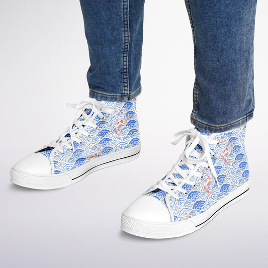 Person wearing hi-top sneakers with blue and white pattern and koi fish.