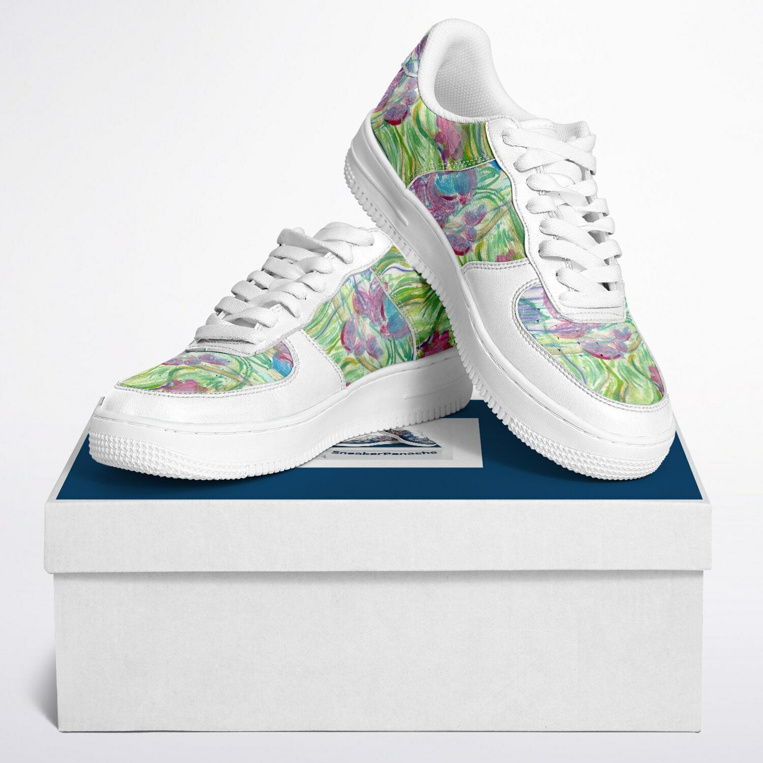 Low top sneakers with Van Gogh inspired landscape in green and pink.