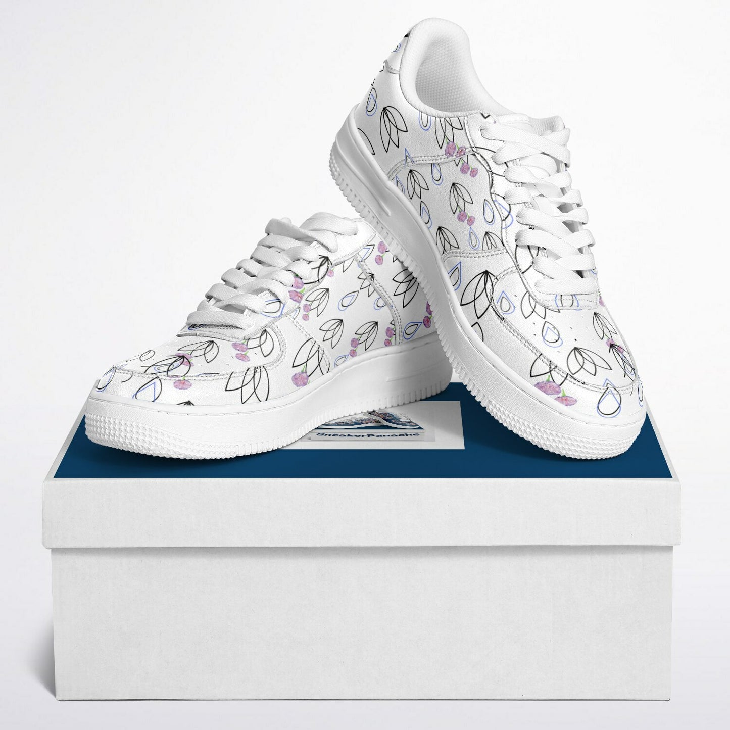 Low-top sneakers with teardrop design in black and blue with pink poppies.